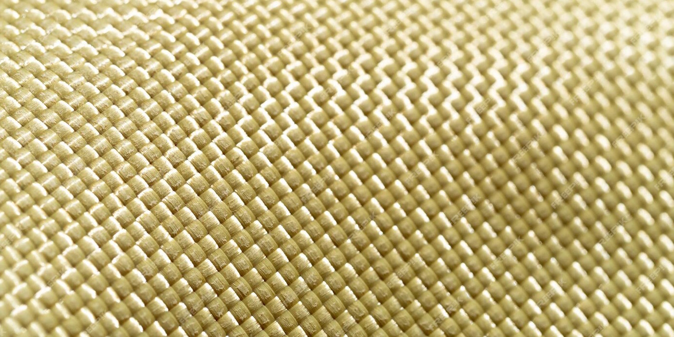materiale-antiproiettile-aramidico-sfondo-brillante-in-kevlar-aramidico-trama-e-motivo-in-kevlar-giallo_158388-9354